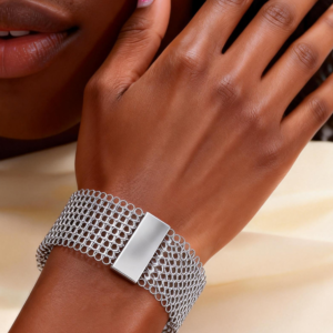 Hand-knitted cuff bracelet, graphite with transparent rubber inlay